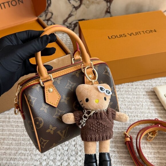 Louis Vuitton. Handbags - Louis Vuitton Monogram Mini Speedy Bag w/ Cute Hello Kitty Charm Handmade Detail